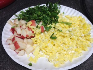 Chick treats: scrambled eggs, apple and parsley
